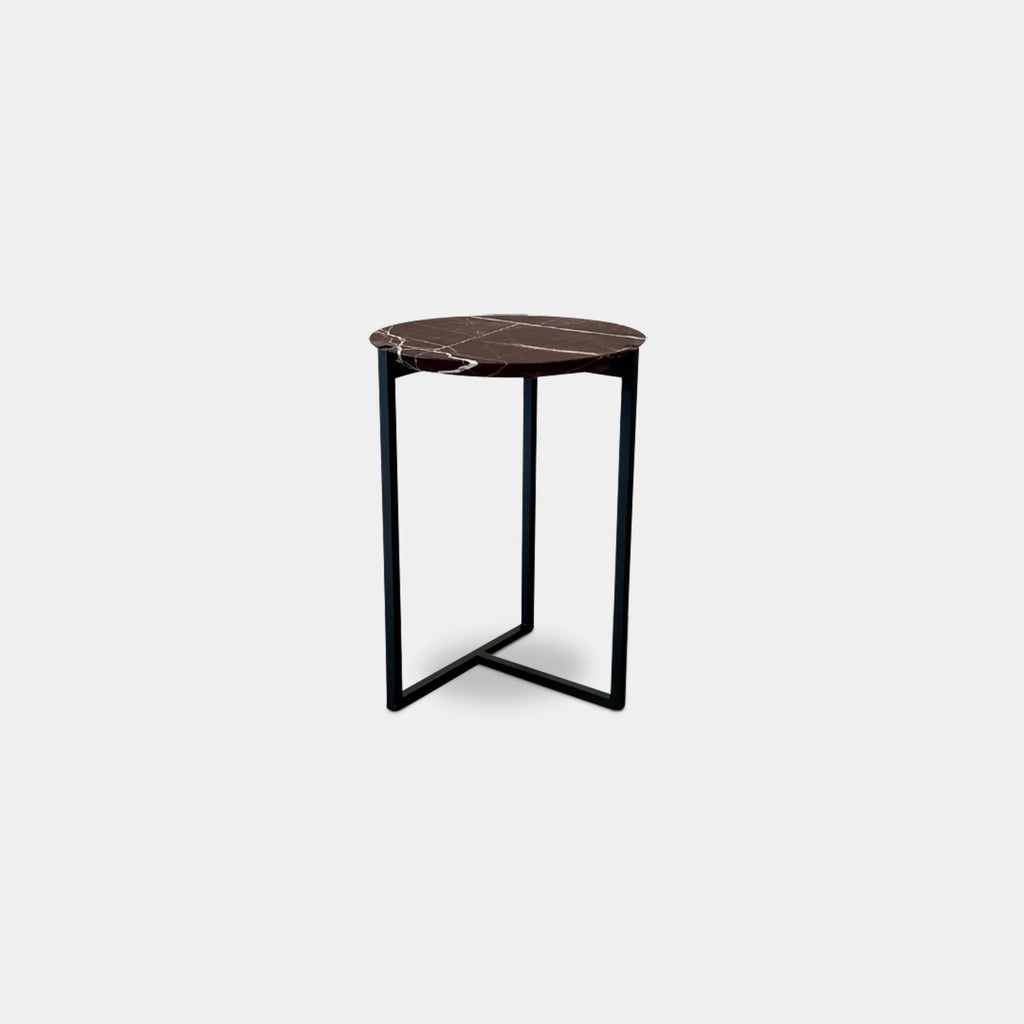 Introducing the Baxter Icaro Lepanto Marble Accent Table - Small, featuring a sophisticated Lepanto marble top and durable black metal legs, ideal for enhancing any interior setting with its elegance against a crisp white backdrop.