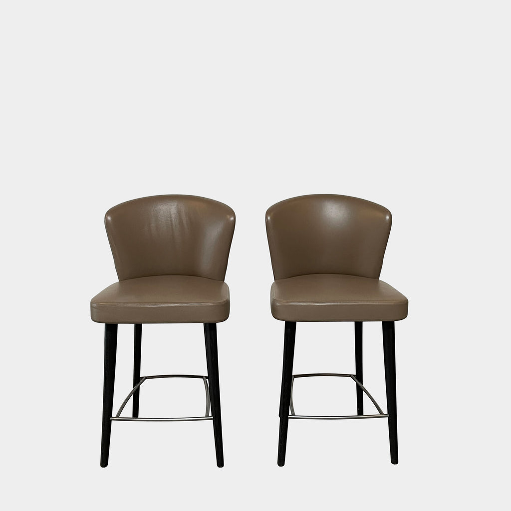 Two Minotti Aston Counter Stool Sets in Dark Taupe, featuring dark taupe leather cushioned seats and curved backs with black legs, are set against a plain white background.