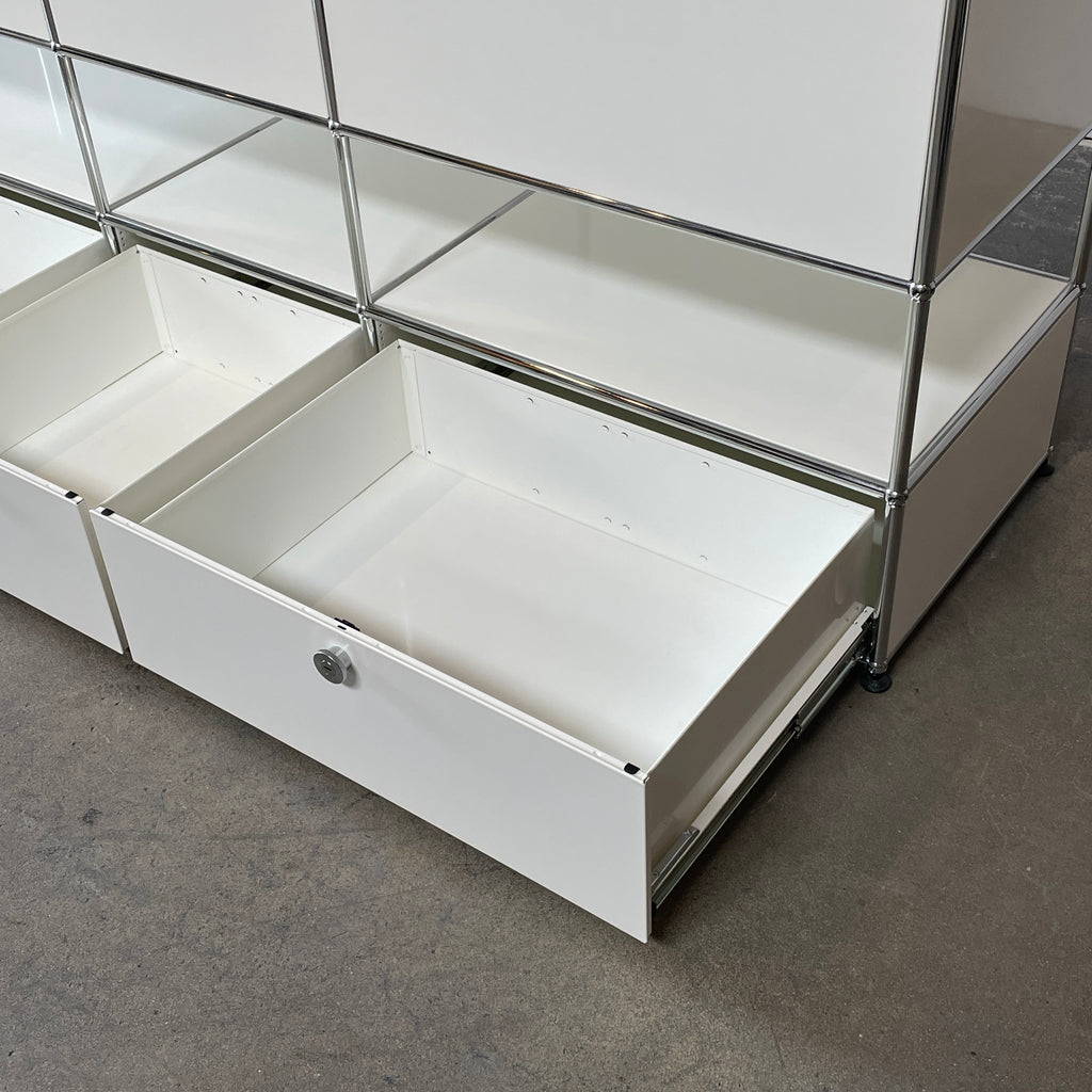 A USM Haller White Cabinet / Console with six compartments, featuring a minimalist design and a chromed steel frame, reminiscent of the USM Haller Office Cabinet.