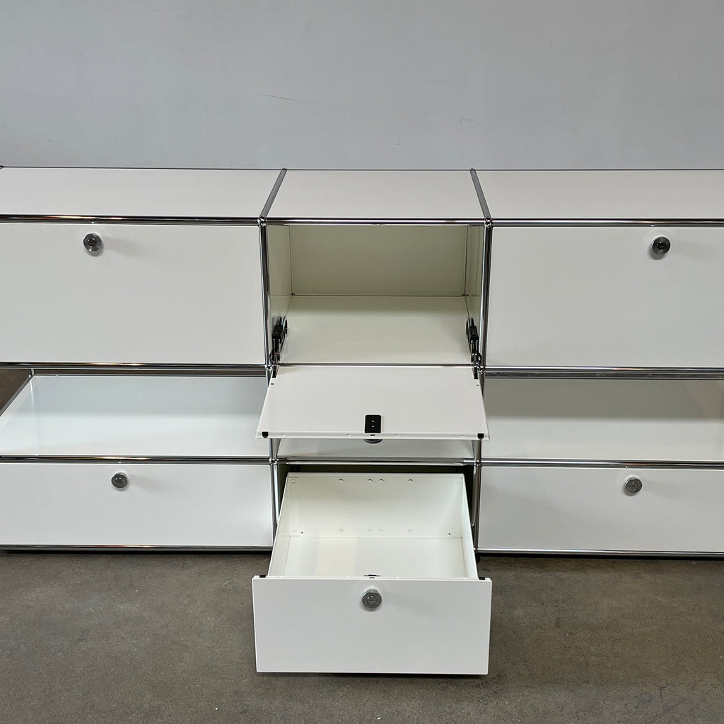 A USM Haller White Cabinet / Console with six compartments, featuring a minimalist design and a chromed steel frame, reminiscent of the USM Haller Office Cabinet.