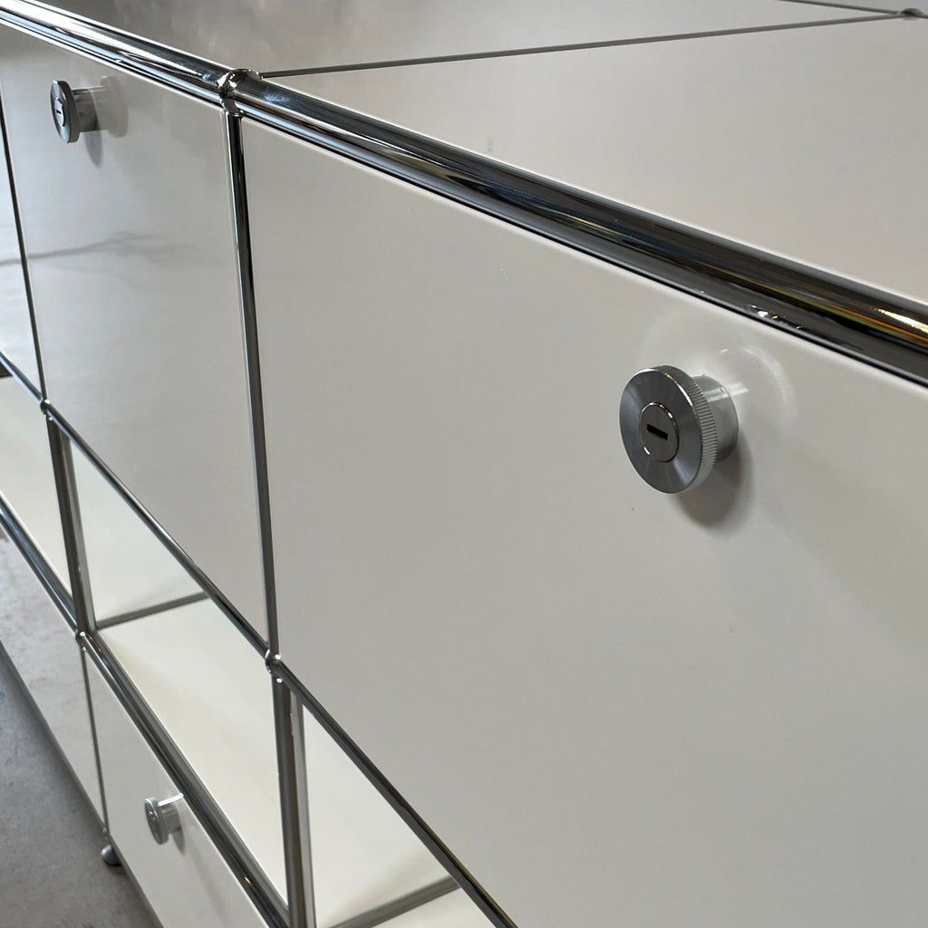 A USM Haller White Cabinet / Console with six compartments, featuring a minimalist design and a chromed steel frame, reminiscent of the USM Haller Office Cabinet.