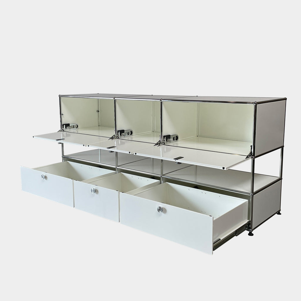 A USM Haller White Cabinet / Console with six compartments, featuring a minimalist design and a chromed steel frame, reminiscent of the USM Haller Office Cabinet.