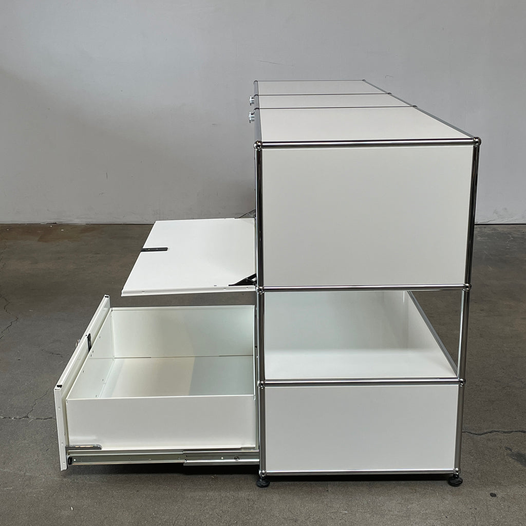 A USM Haller White Cabinet / Console with six compartments, featuring a minimalist design and a chromed steel frame, reminiscent of the USM Haller Office Cabinet.