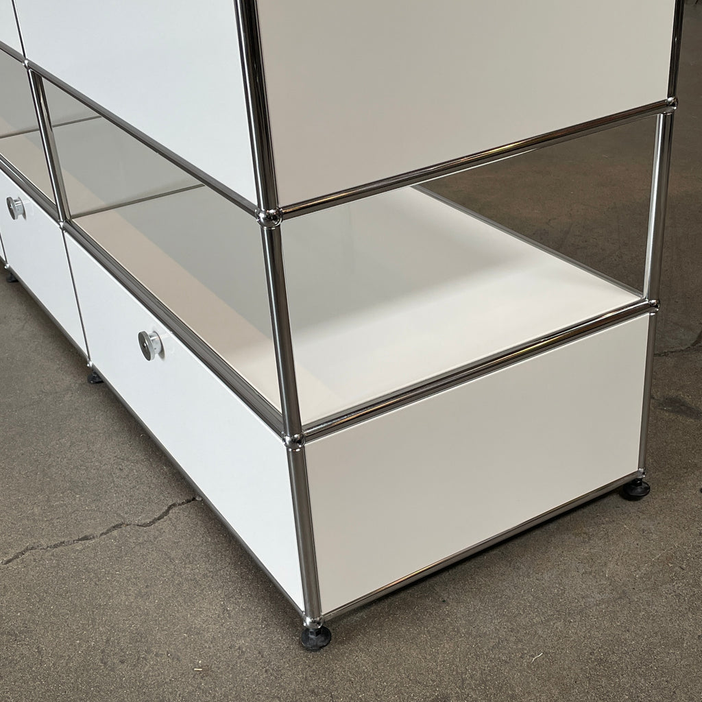 A USM Haller White Cabinet / Console with six compartments, featuring a minimalist design and a chromed steel frame, reminiscent of the USM Haller Office Cabinet.