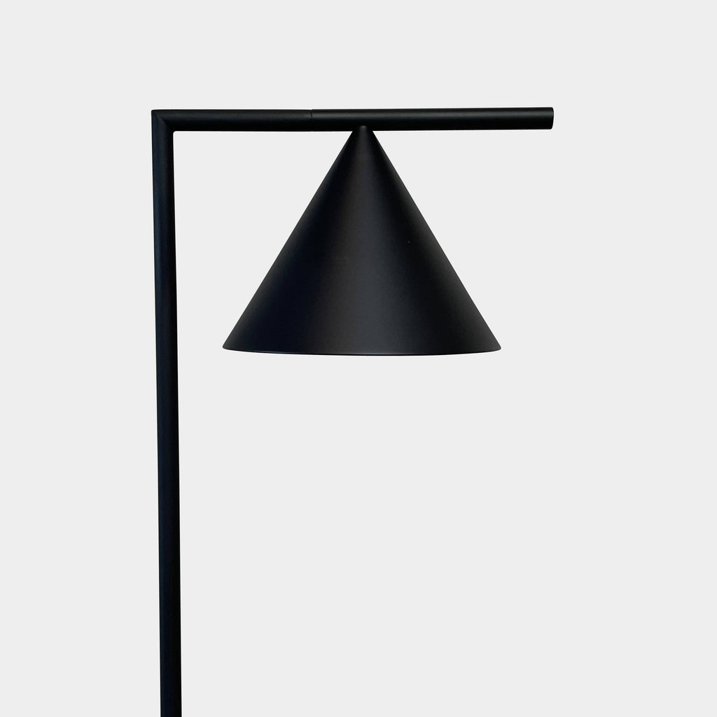 A Flos Captain Flint Floor Lamp with a conical shade, a round base, and a power cord with a foot switch on a plain white background.