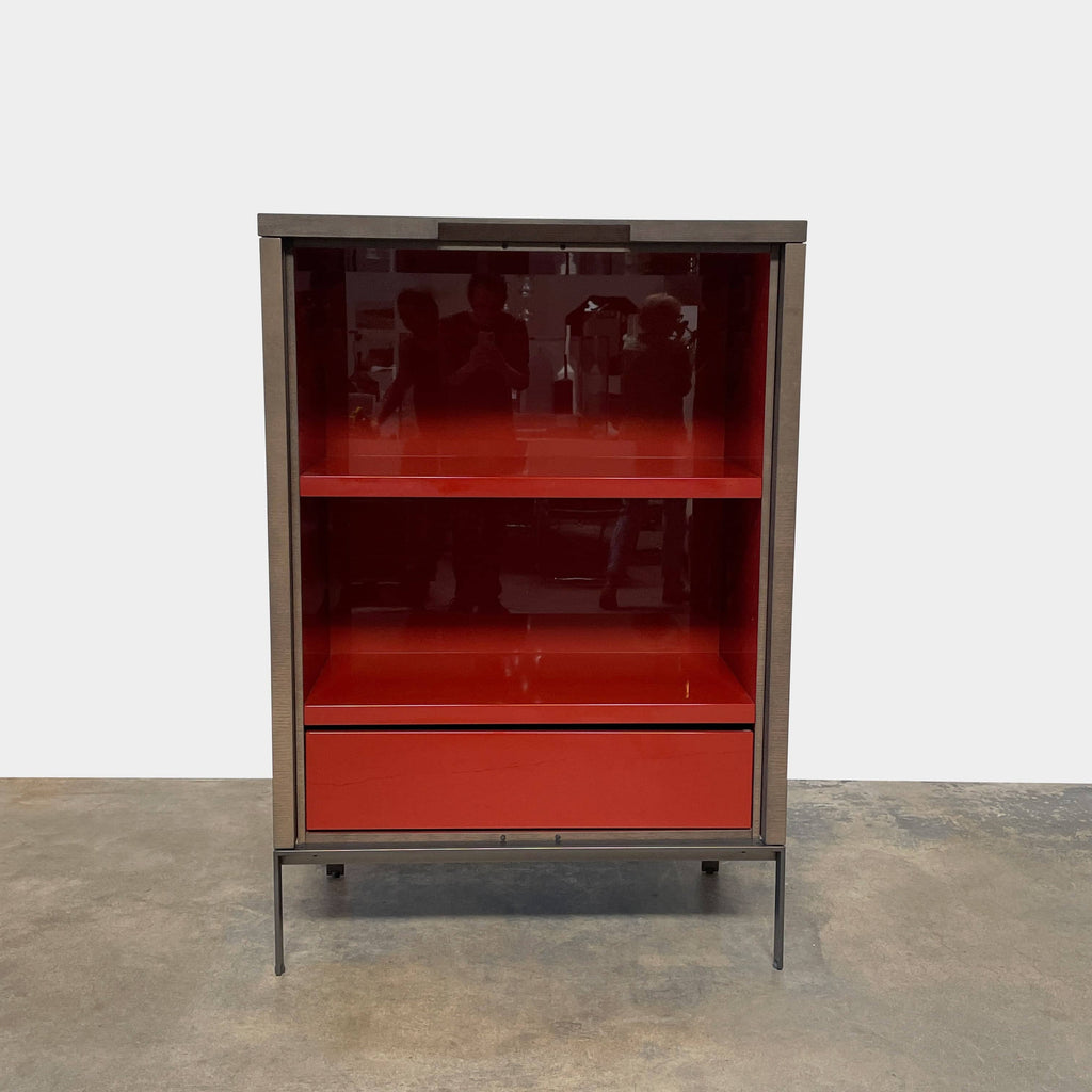 A Maxalto Mida High Cabinet featuring a brown wooden finish, two doors, and black metal legs stands elegantly against a white background.