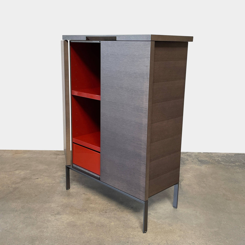 A Maxalto Mida High Cabinet featuring a brown wooden finish, two doors, and black metal legs stands elegantly against a white background.