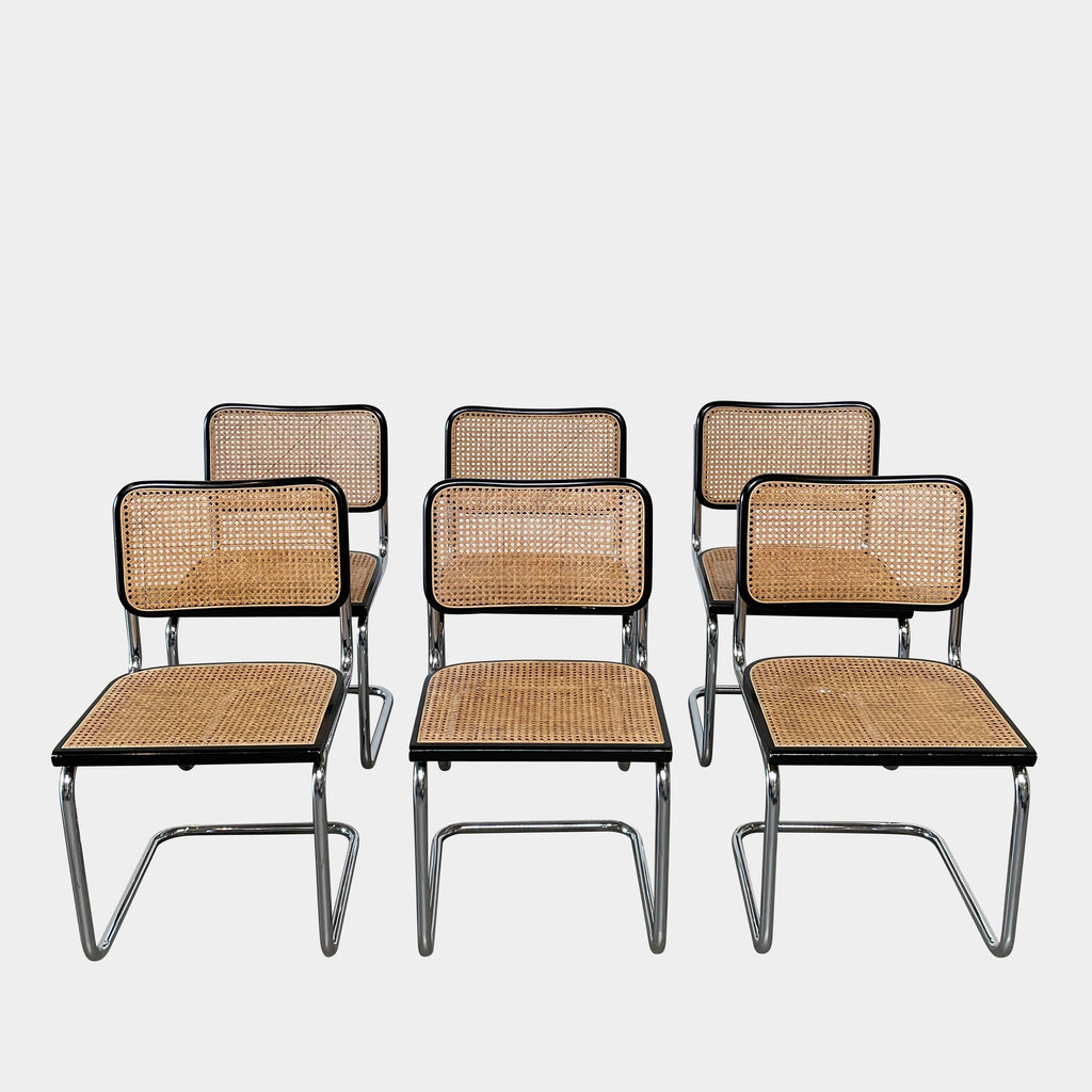 Six identical Marcel Breuers Cesca Dining Chairs from the Vintage brand, featuring cane webbing seats and backrests on chrome tubular frames, are arranged in two rows against a plain white background. This modernist classic showcases the timeless elegance of functional design.