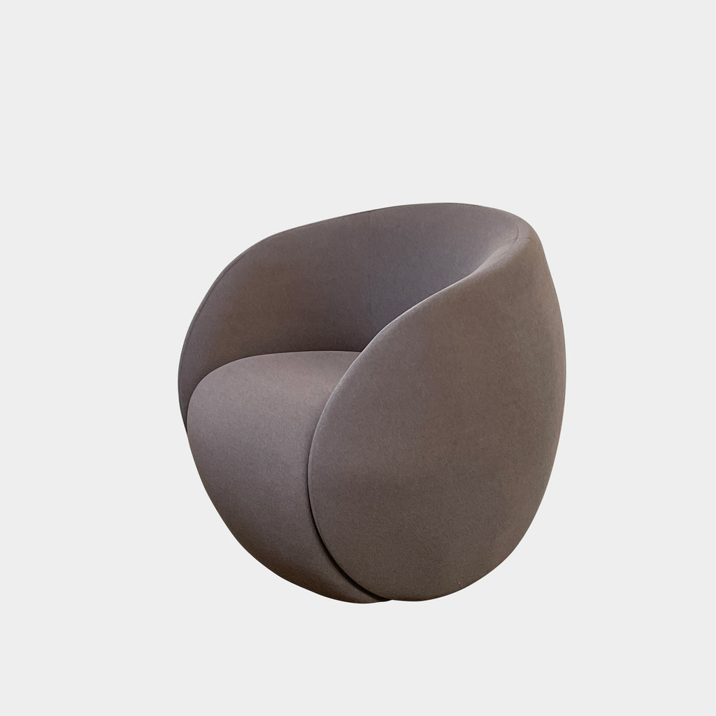 Two Roche Bobois Dot Chairs from the prestigious Roche Bobois brand, featuring a sleek grey and modern curved design, are positioned on a plain, light background. One chair faces forward while the other showcases its side profile, enhancing their sophisticated allure.