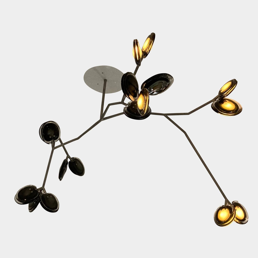 The Bocci Armature Chandelier T16.17aA1 is a modern ceiling lamp with an abstract, branching design, featuring multiple circular LED light fixtures crafted with elegant molten glass elements.